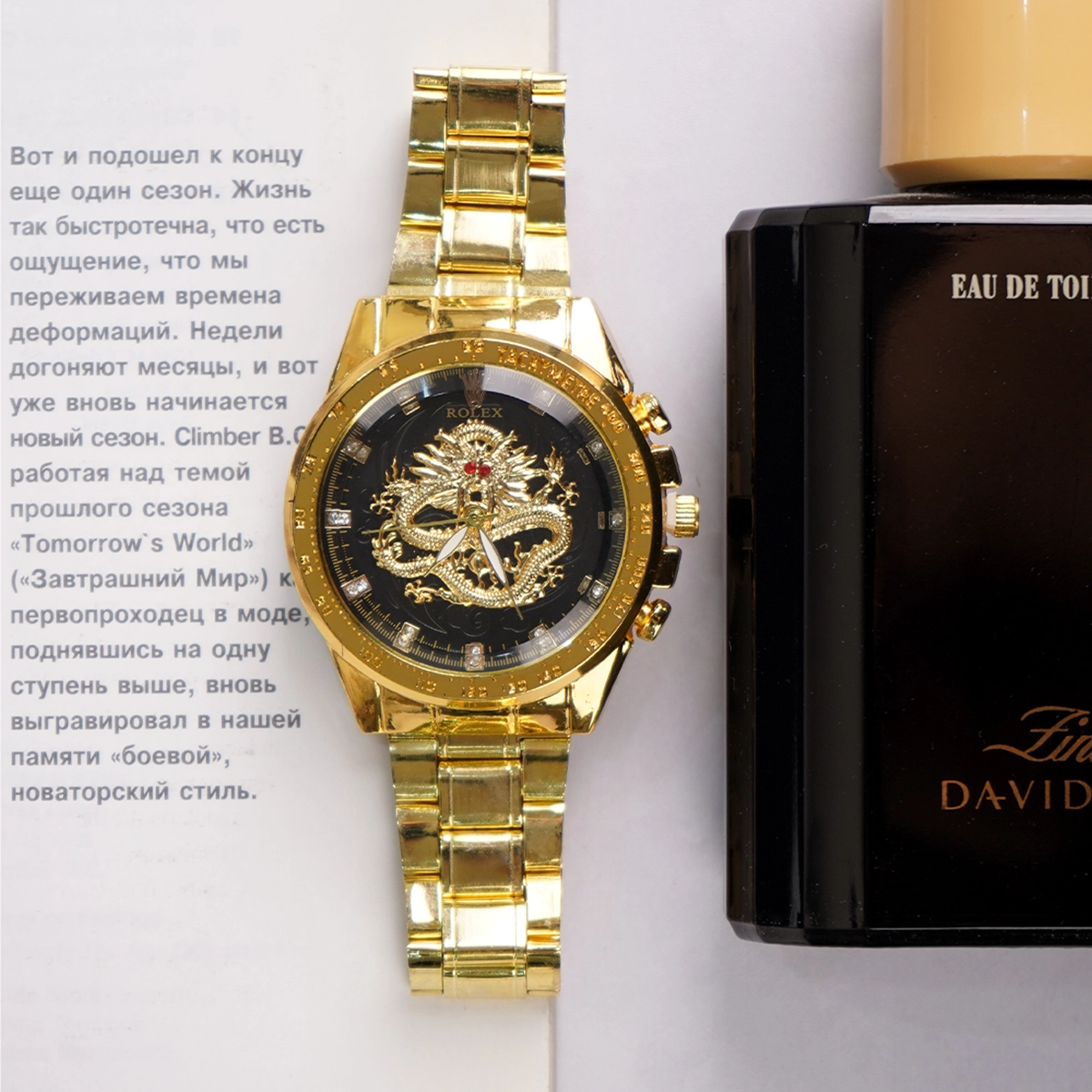 ساعت مردانه طلایی صفحه مشکی مدل DRAGON