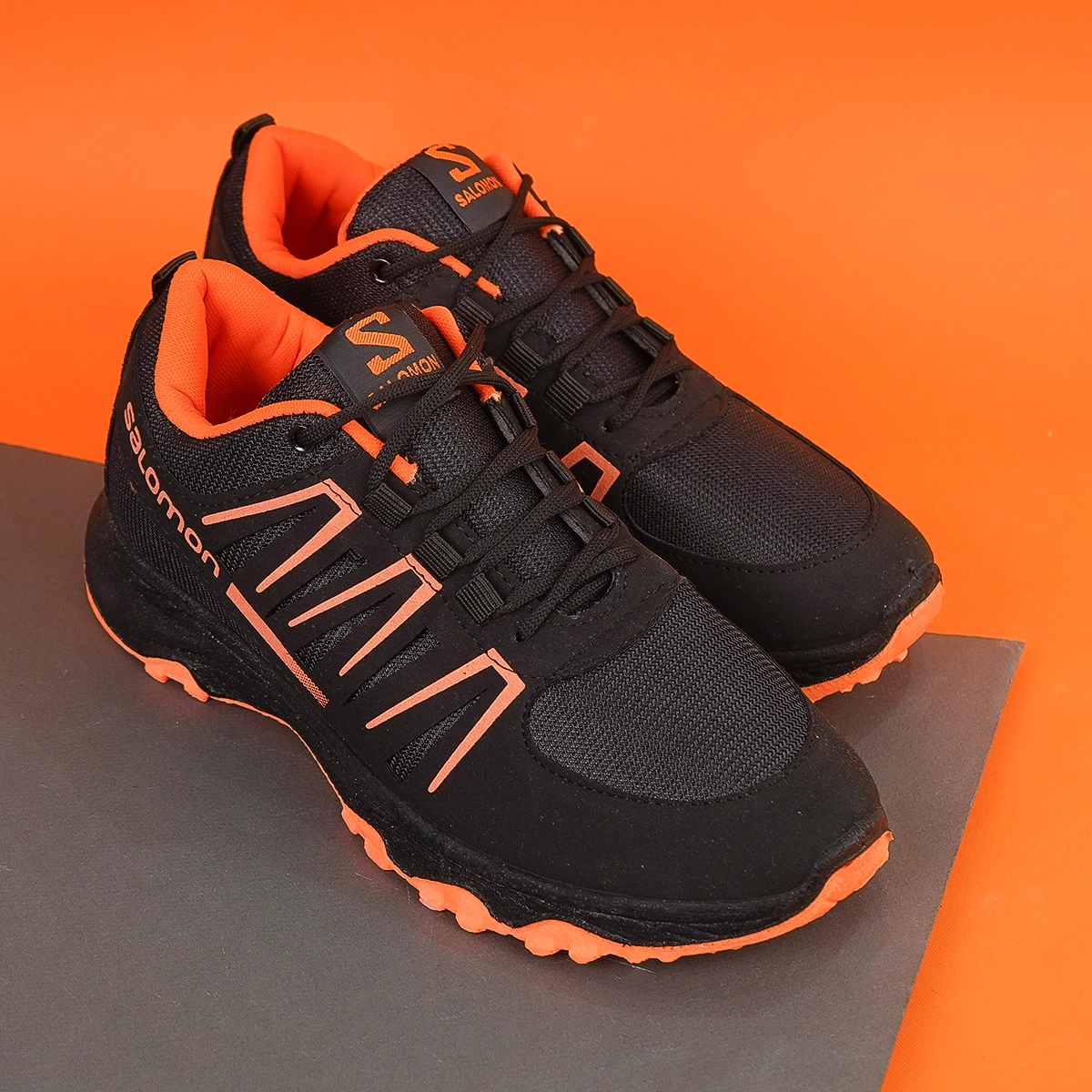 کفش ورزشی مردانه مشکی نارنجی Salomon مدل BAHRAM