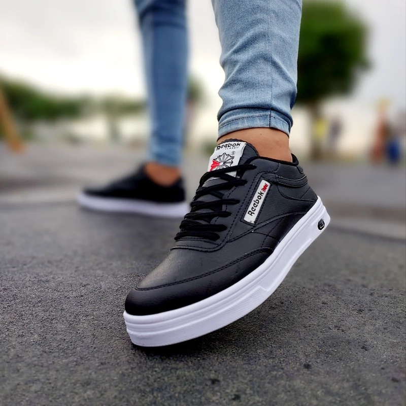 کفش ورزشی Reebok مردانه مشکی زیره سفیدمدل Flag