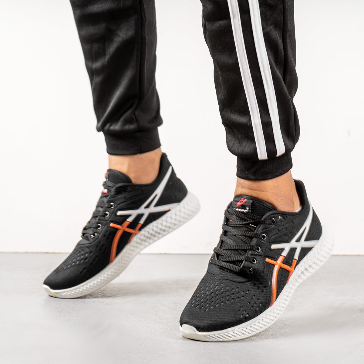 کفش ورزشی Asics مردانه مشکی نارنجی مدل Nardin(T)